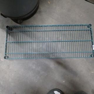Green Metro shelf, 36x14 inches, wire design, used condition. Durable construction, visible authentic Metro label.