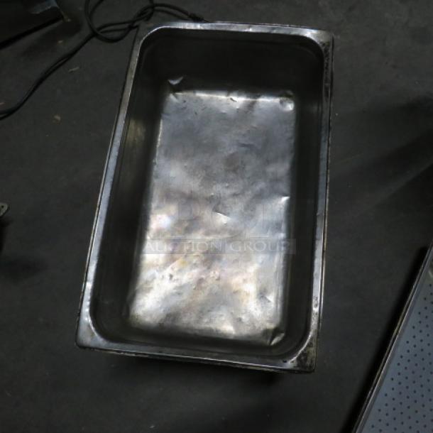 Full-size 6-inch deep hotel pan, stainless steel, used condition, slight wear visible, suitable for commercial kitchens.