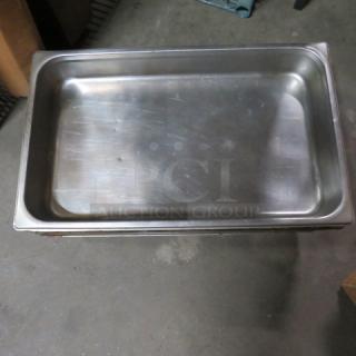 Full-size 2.5-inch deep stainless steel hotel pan, lightly scratched, suitable for commercial kitchen use. Model 2XBID.