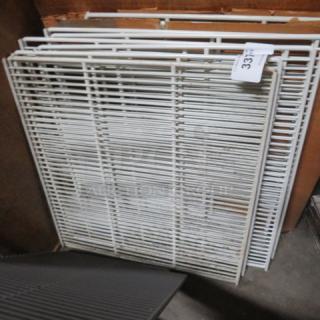 22x24 wire rack, white, stackable, sturdy, slightly used condition. Tag indicates item number 331.