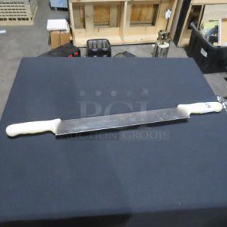 One Double Handle Pizza Cutter. - Item #1214697