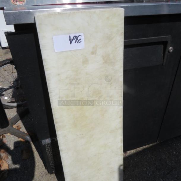 White 36x12 cutting board with a visible "364" label, slightly worn surface, suitable for kitchen use.