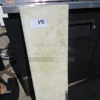 White 36x12 cutting board with a visible "364" label, slightly worn surface, suitable for kitchen use.