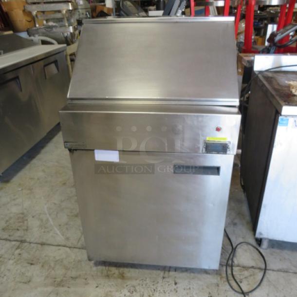 Delfield 1 Door Refrigerated Prep Table, Model 18MC27P-BI, stainless steel, 27x32x49 inches, on casters, includes 2 racks.