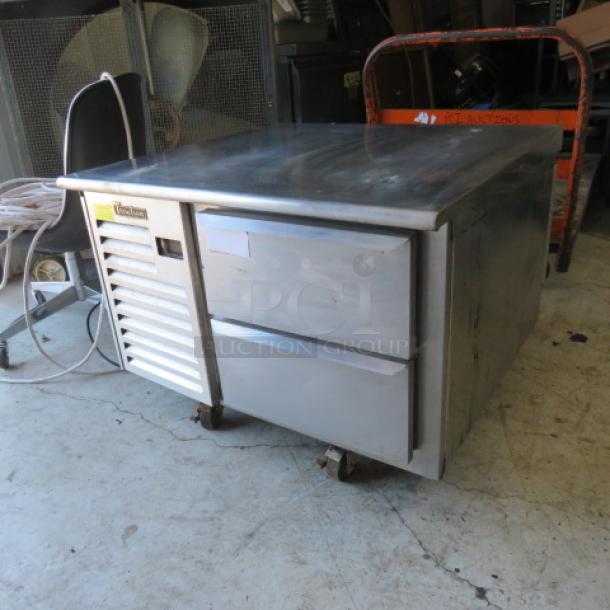 Traulsen 2 Drawer Chef Base, Model# TEO36HT, on casters. Stainless steel, 36x34x26.5 inches, with front vent.