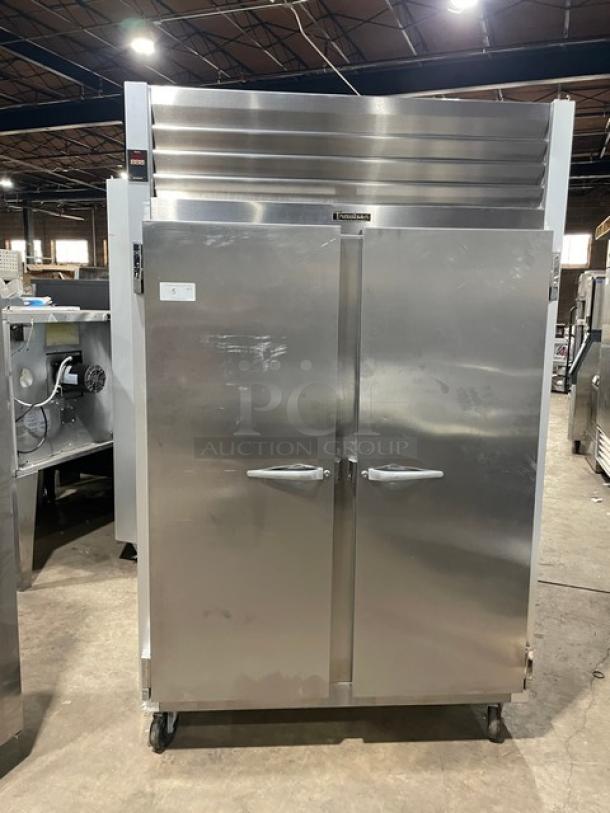 Traulsen G-Series stainless steel 2-door refrigerator, Model G20010, on casters, with poly coated wire rack, Energy Star certified.