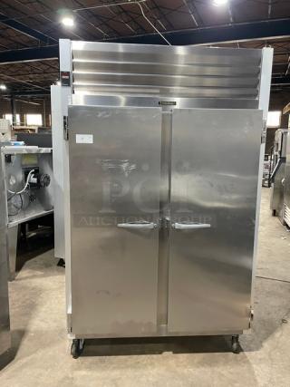 Traulsen G-Series stainless steel 2-door refrigerator, Model G20010, on casters, with poly coated wire rack, Energy Star certified.