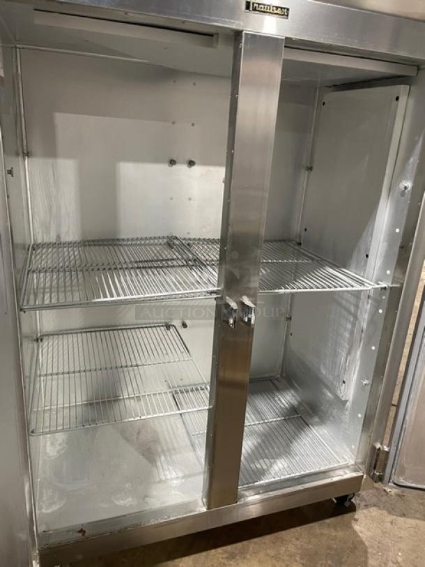 Traulsen G-Series 2 Door Stainless Steel Refrigerator, Model G20010, Energy Star Certified, with poly-coated racks, on casters.