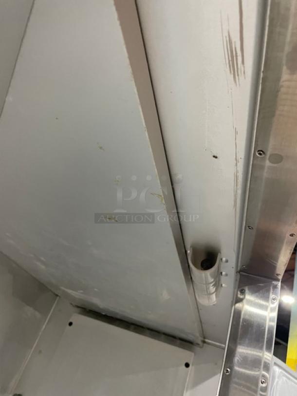 Traulsen G-Series stainless steel 2-door reach-in refrigerator, Model G20010. Includes poly-coated wire rack, on casters.