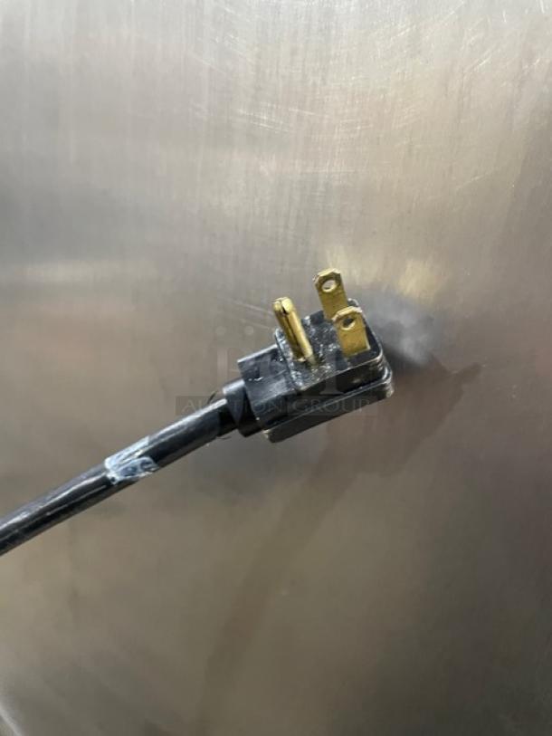 Traulsen G20010 2 Door Refrigerator, Energy Star certified, stainless steel, with plug shown. Model: G20010, SN: T61822H07.