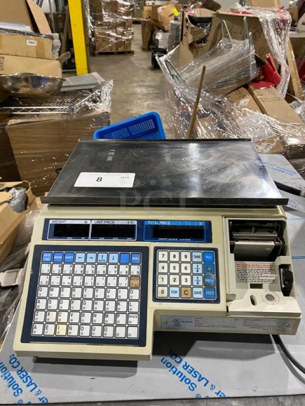 CAS-USA LP1000 digital price computing scale with label printer, stainless steel worktop, 30 lb capacity. Good condition.
