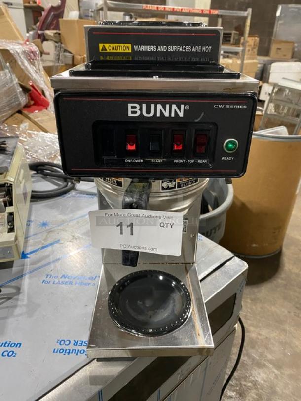 Bunn CWT35 stainless steel coffee machine with dual warmer plates, brew basket, and control panel. Model: CWT35 SN: CWT069469AC.