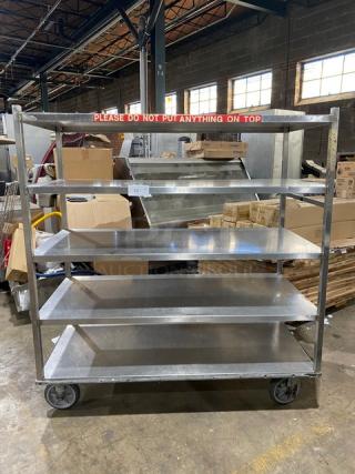 Commercial stainless steel 5-tier utility cart on casters, features a "Please do not put anything on top" label, gently used.