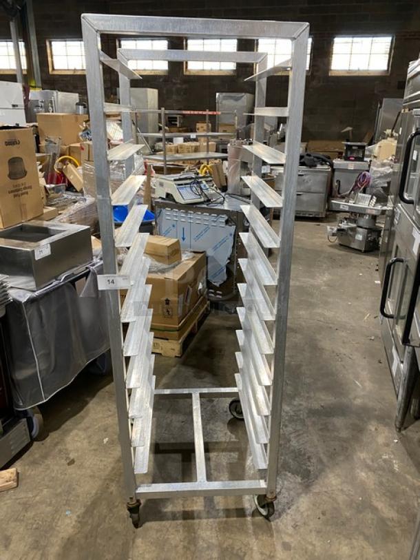 Alexander Industries heavy-duty pan holding/transport rack on casters, excellent condition, durable metal frame, suitable for commercial use.