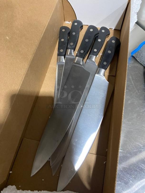 Set of five new Dexter Russell 8" chef knives, model V145-8-PCP, stainless steel, black grip handles, commercial quality.