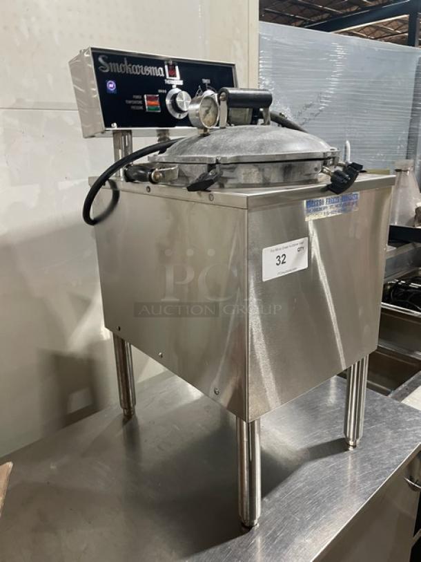 Broaster Smokaroma Series commercial stainless steel electric pressure smoker on legs; features control panel and pressure gauge.
