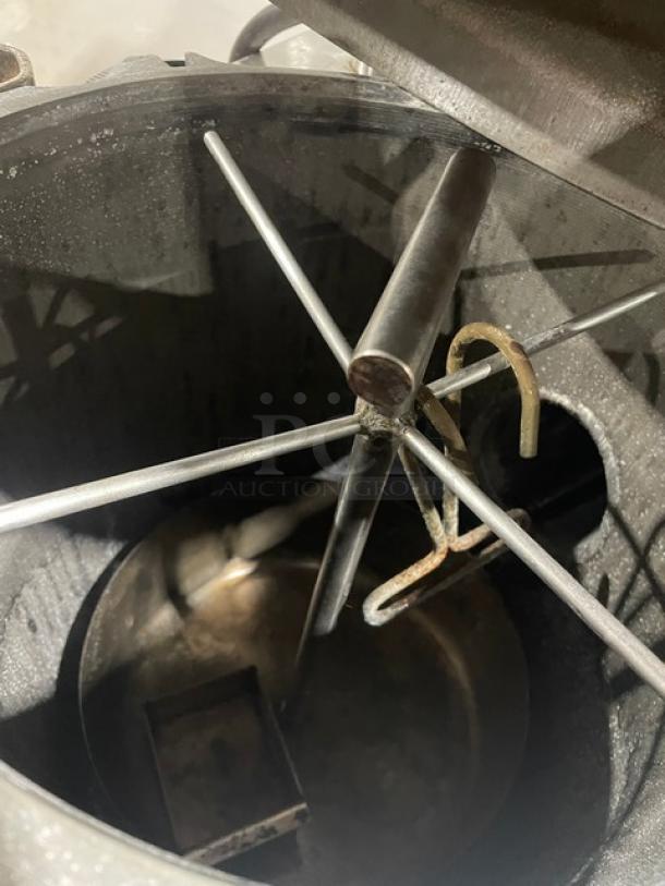 Broaster Smokaroma Series stainless steel electric pressure smoker, interior view, on metal legs, in used condition.