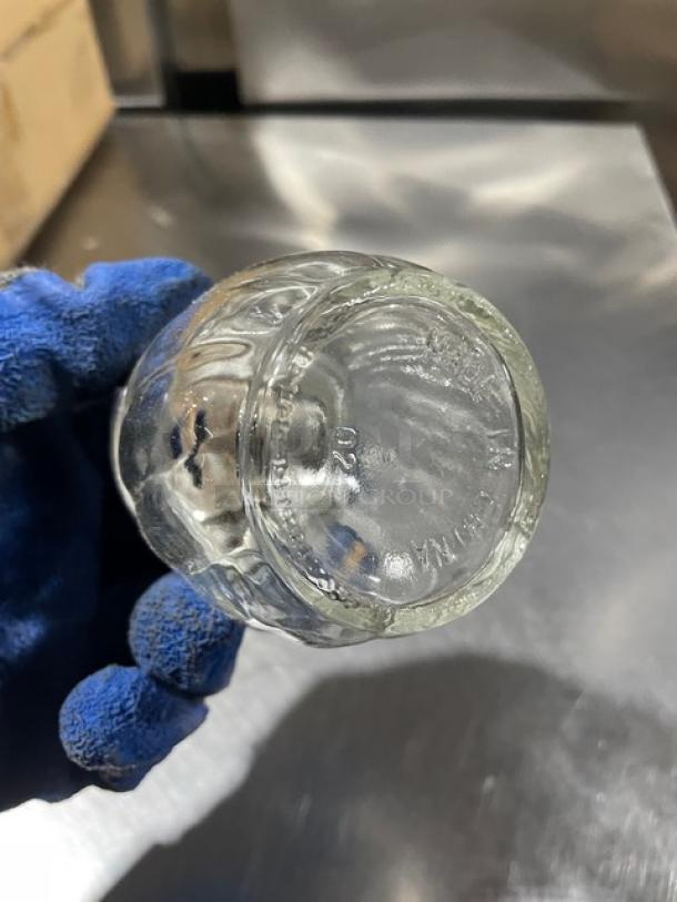 Tablecraft 260SL clear glass 6 oz cheese/spice shaker with swirled style, chrome plated slotted top, new condition.