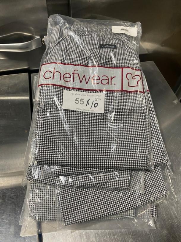 Brand new Chefwear CW11 black & white bar/chef pants in medium. Packaged in clear bag with branding and size label visible.