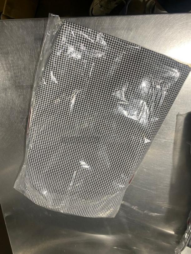 Brand new Chefwear CW11 black & white medium bar/chef pants, sealed in package, showcasing durability and professional style.