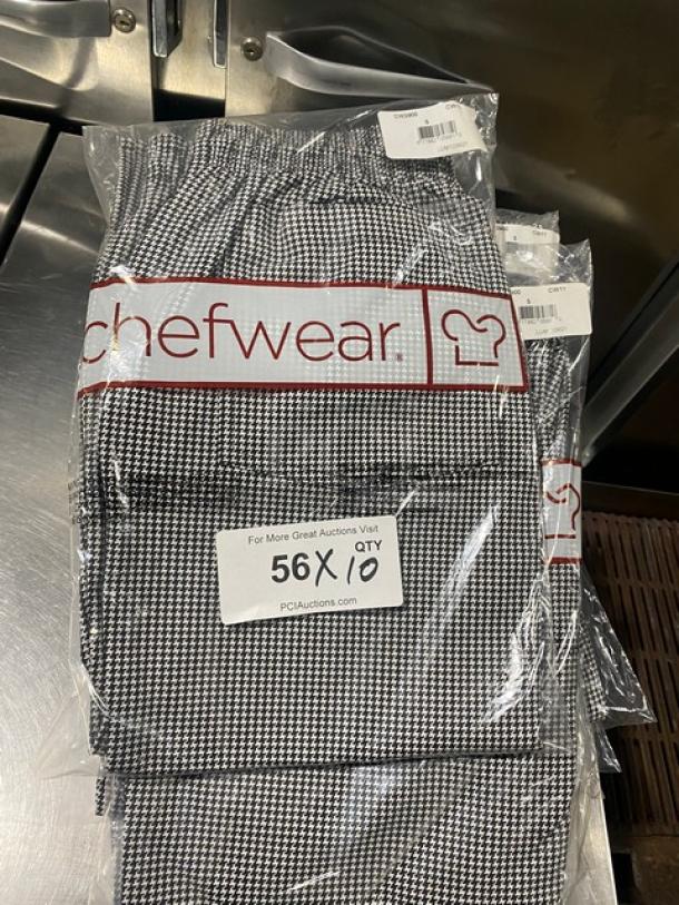 Brand new Chefwear CW3900 black and white chef pants, small size, in packaging. Tags show model and quantity information.