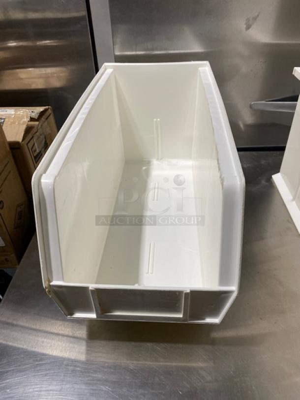 Uline stackable bin, model S-14454, white, sturdy plastic, clean condition, ideal for storage and organization.