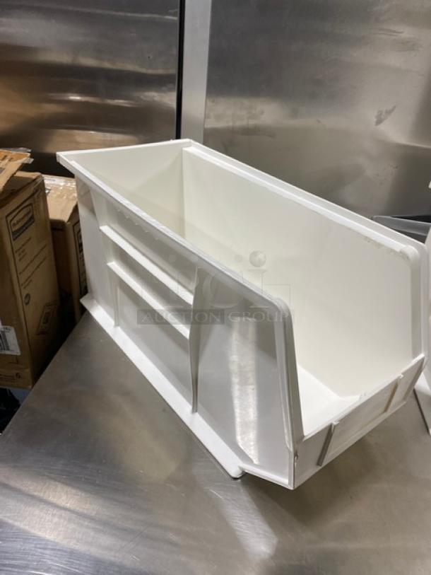 Uline commercial white stackable bin, Model S-14454, in excellent condition, features durable plastic construction.