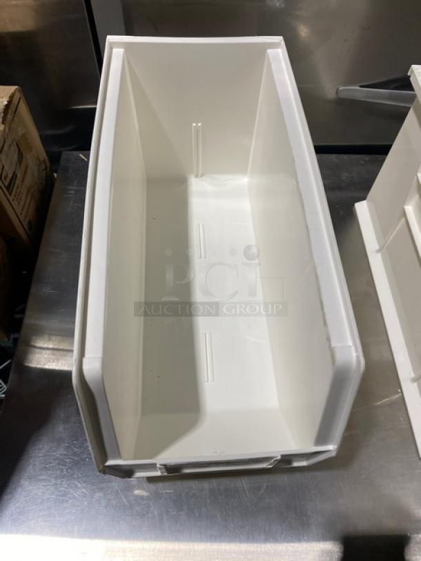 Uline Commercial White Stackable Bin, Model S-14454, in good condition. Durable plastic with interior slots for stacking.