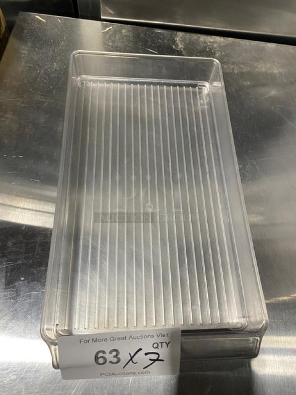 Clear polycarbonate stackable container; measures approximately 7 inches, commercial use, durable, ribbed design.