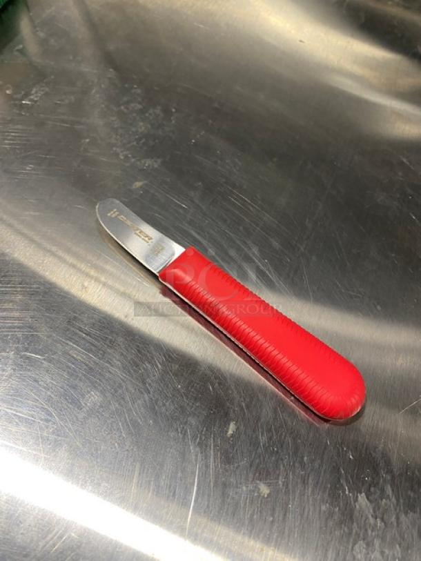 Dexter Russell Sani-Safe 2" scallop knife, Model S124, with red grip handle, stainless steel blade, new condition.
