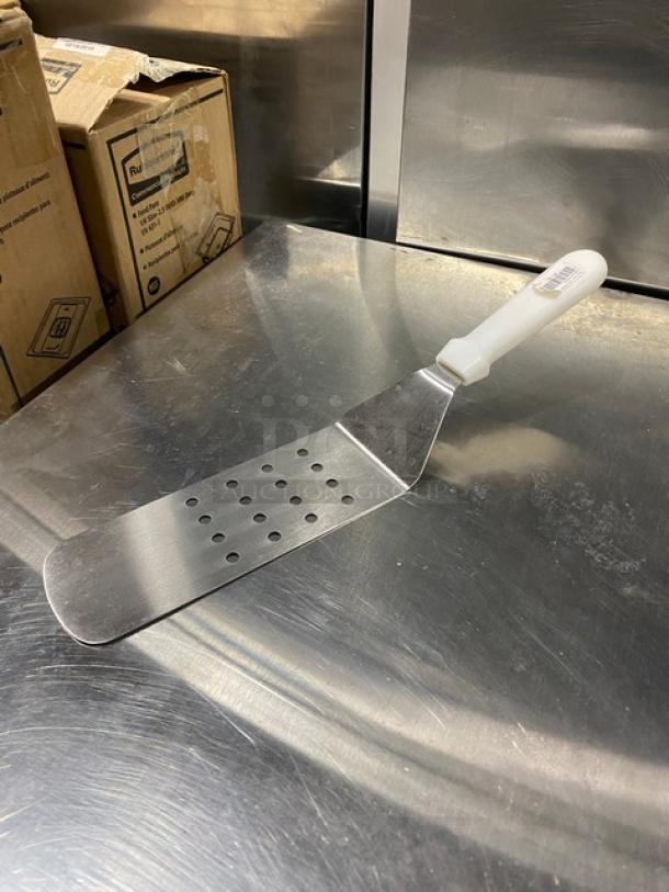 ABC Commercial Stainless Steel Perforated Turner, Model PFT-10P, with white grip handle, brand new condition.