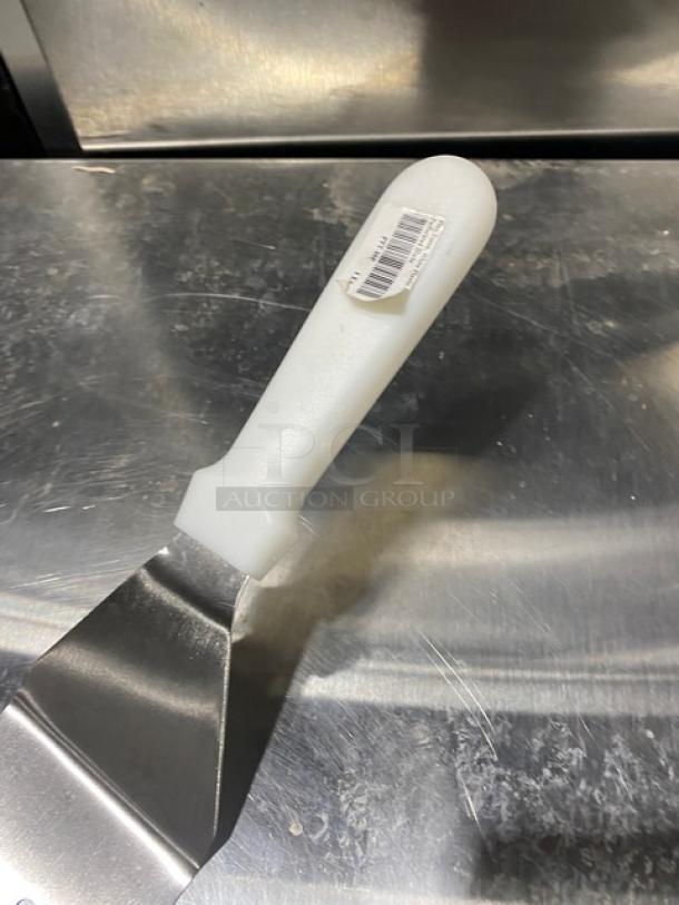 BRAND NEW ABC Commercial Stainless Steel Perforated Turner, Model PFT-10P, with a white grip handle and barcode sticker.