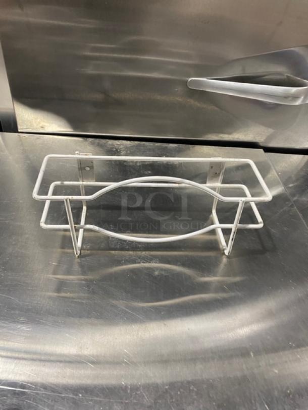 White wired wall-mount glove box holder/dispenser, commercial use, excellent condition, with mounting brackets.