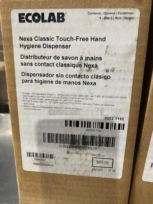 Brand new Ecolab Nexa Series black no-touch wall-mount foam hand hygiene dispenser, Model 9202-1192, in box.