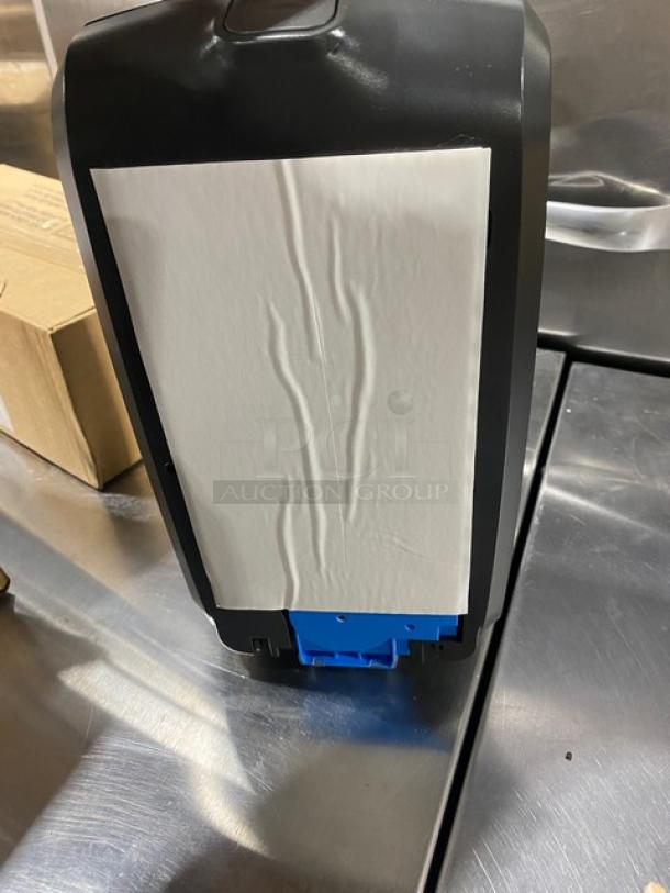 Brand new Ecolab Nexa Series black no-touch wall-mount foam dispenser, model 92021192.