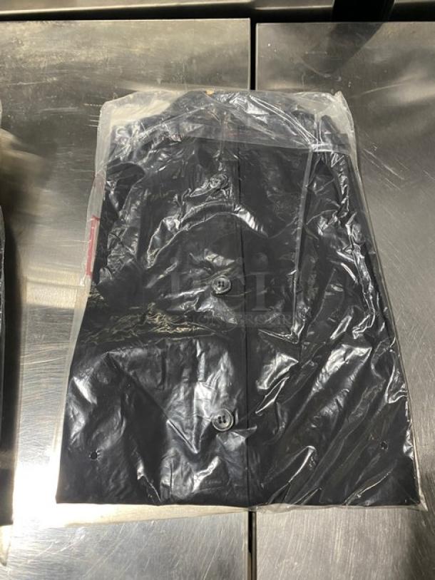 Brand new Chefwear CW1333CW30 black chef pants, size L, sealed in plastic. Ideal for commercial kitchen use.