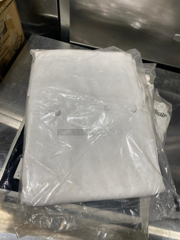 Brand new Chef Revival LJ028-4X ladies chef jacket, white polyester/cotton blend, 4X size, in packaging.
