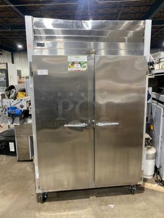 Traulsen G-Series Commercial Stainless Steel Solid 2 Door Reach In Freezer! With Poly Coated Wired Rack! Model: G22010 SN: 21E00206! 115V 1 Phase! On Casters! - Item #1213964