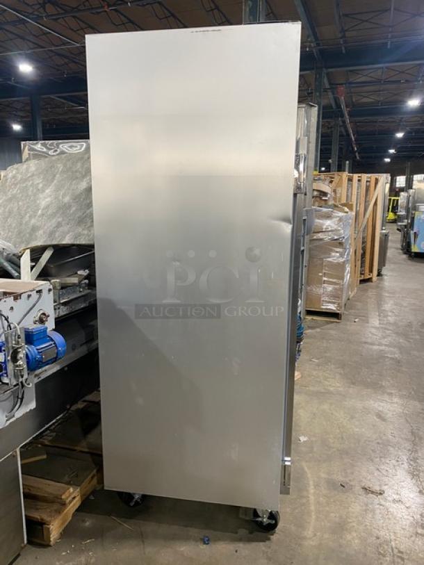 Traulsen G-Series stainless steel 2-door reach-in freezer, model G22010, on casters, with poly-coated wire rack.