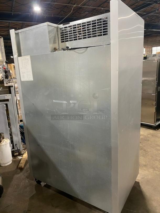 Traulsen G-Series stainless steel 2-door reach-in freezer, model G22010, on casters, with poly-coated wire rack.