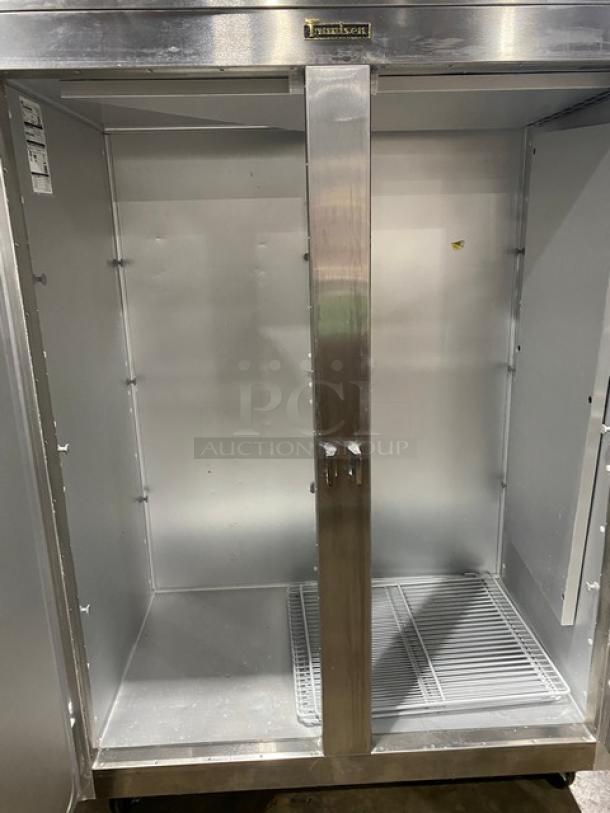 Traulsen G-Series 2 Door Commercial Freezer, model G22010, stainless steel, poly-coated rack, on casters, 115V, 1 phase.
