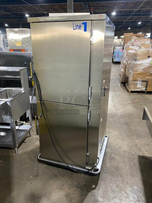 FWE MTU-12PDD stainless steel 12-pan heated cabinet with Dutch doors, moisture-temp humidifier, and adjustable tray slides.