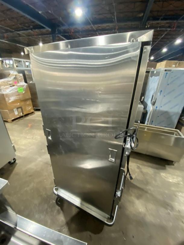 FWE Commercial stainless steel Dutch door heated holding cabinet, model MTU-12PDD, with caster wheels and moisture-temp humidifier system.