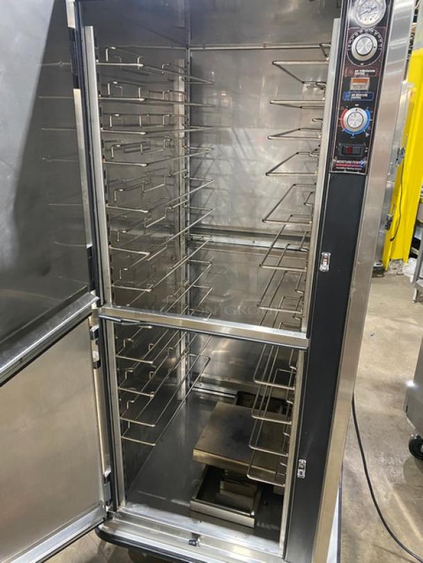 FWE MTU-12PDD stainless steel pass-thru heated cabinet with 12-pan capacity, adjustable tray slides, and humidifier system.