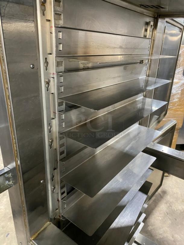 Victory HA1D7PT stainless steel warming cabinet with wide pan slides. Electric-powered, excellent condition, on legs.