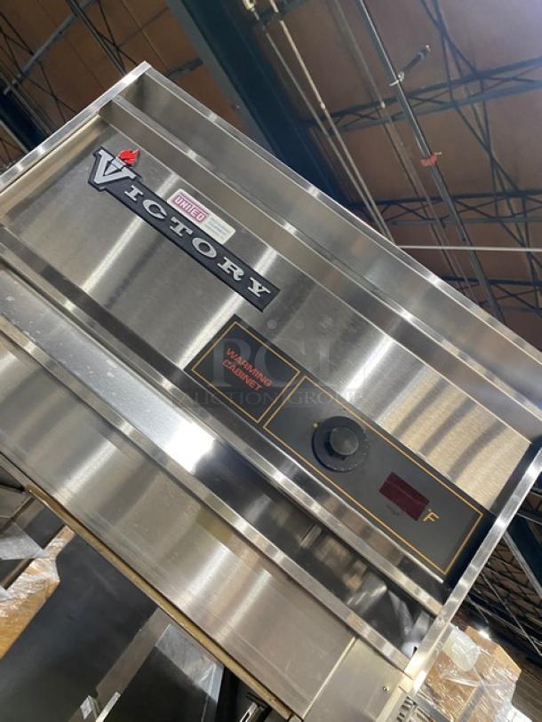 Victory commercial electric stainless steel warming cabinet, model HA-1D-7-PT, with wide pan slides, excellent condition.
