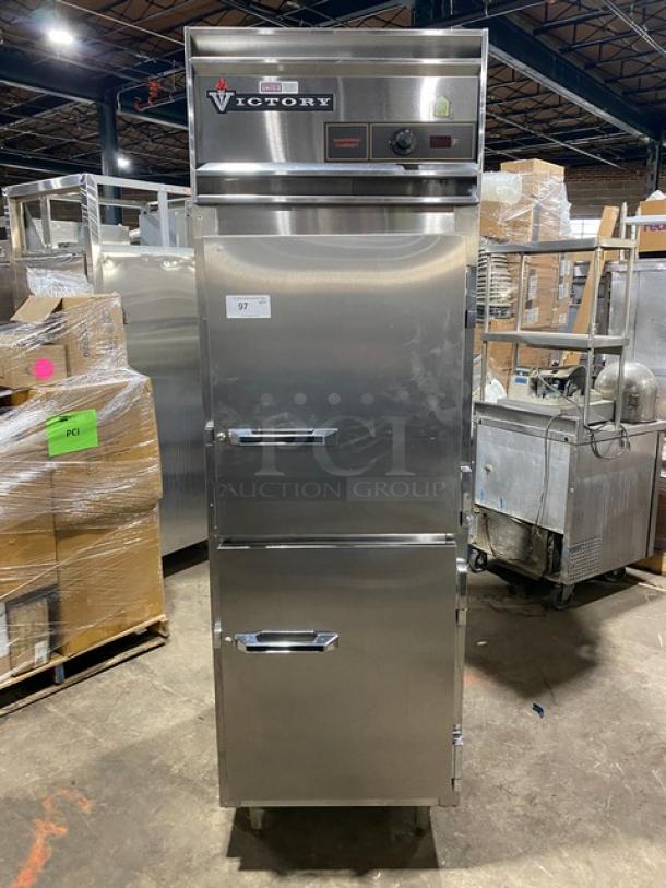 Victory Commercial Stainless Steel Dutch Door Electric Warming Cabinet, Model HA-1D-7-PT. Features wide pan slides, visible controls, and legs.