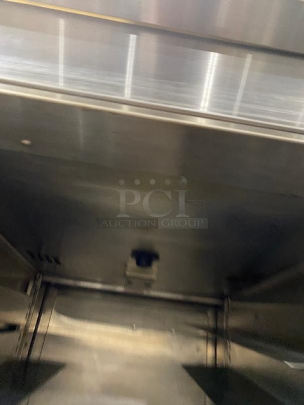 Victory HA-1D-7-PT stainless steel warming cabinet interior with wide pan slides, electric-powered, on legs, commercial use.