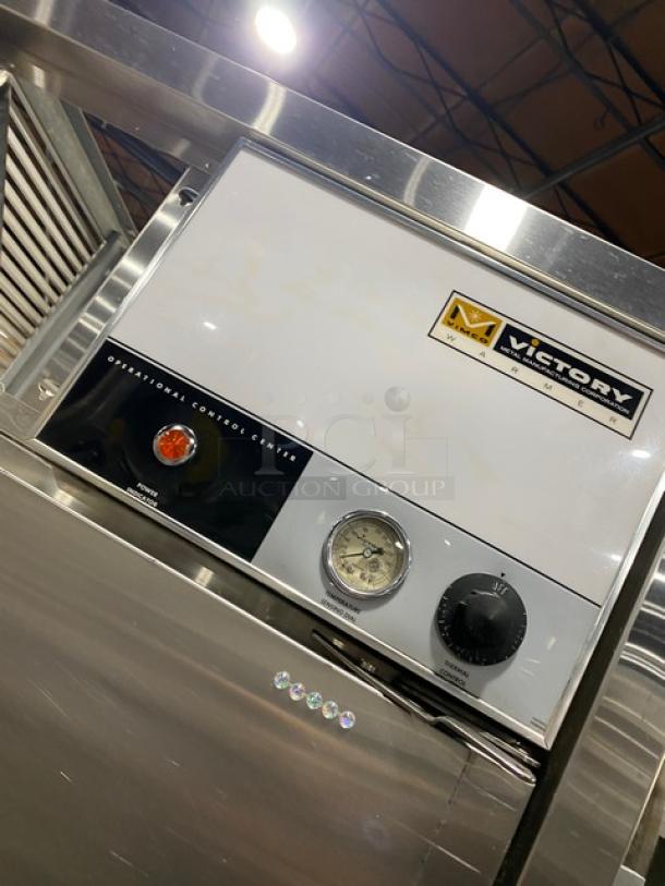 Victory commercial stainless steel pass-thru heated cabinet, model HS-1D-PT. Features include built-in pan slide, control center.
