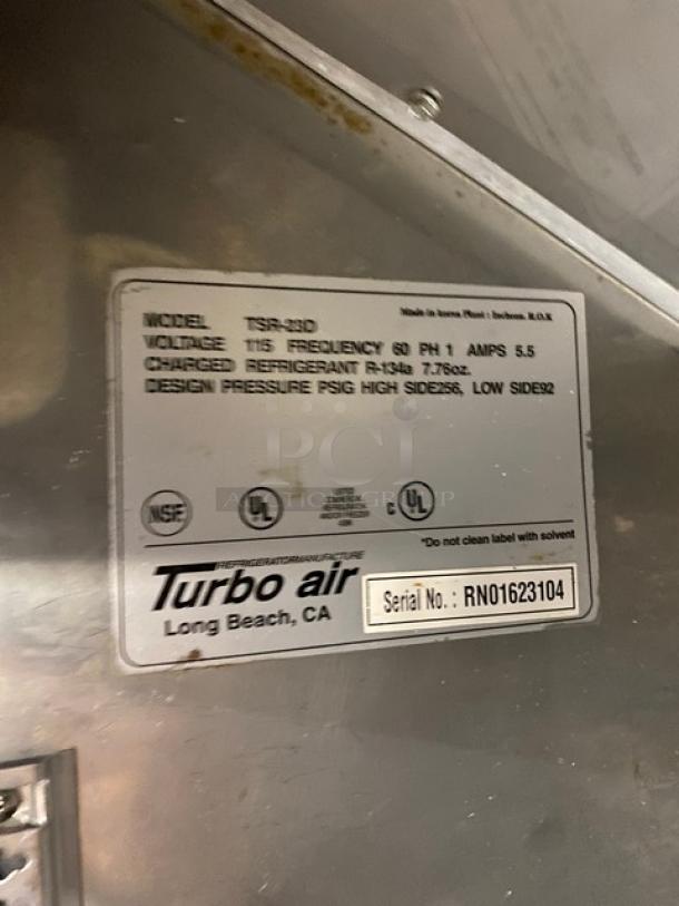 Turbo Air Deluxe Cooler TSR-23D label, showing model, voltage, refrigerant info, and serial number RN01623104.